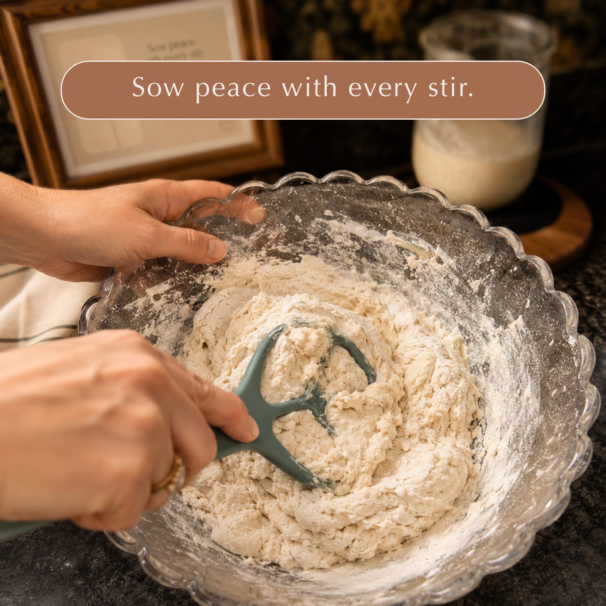 Sow peace with every stir. Peace Dough Whisk mixing dough in a glass bowl